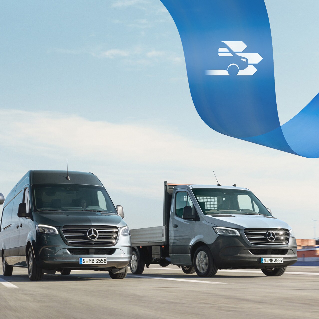 Una serie di veicoli commerciali Mercedes-Benz su una strada