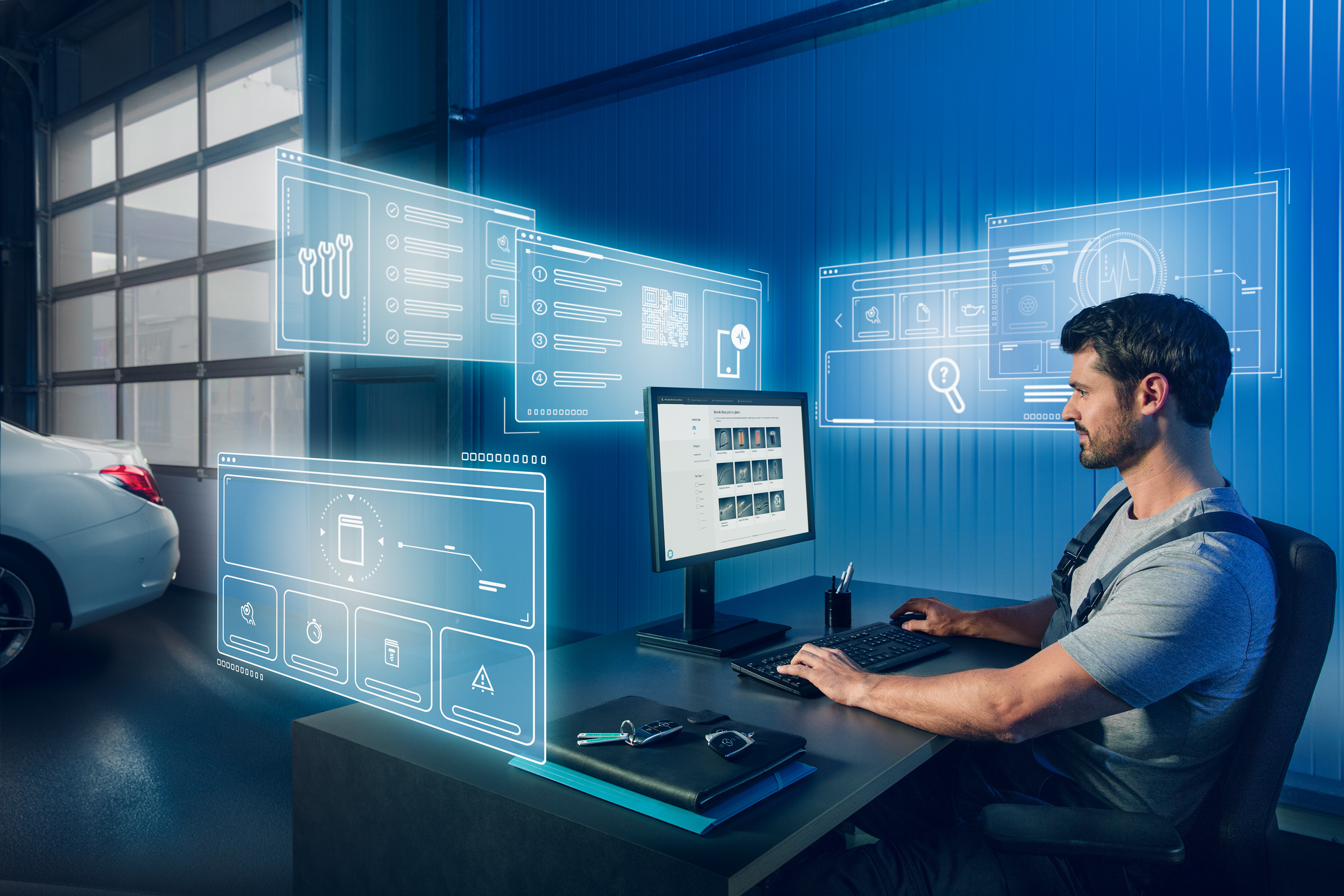 Mercedes-Benz | Ricambi originali di qualità per i veicoli commerciali Un meccanico mentre cerca i ricambi originali Mercedes-Benz adatti nel catalogo ricambi Mercedes sul computer.